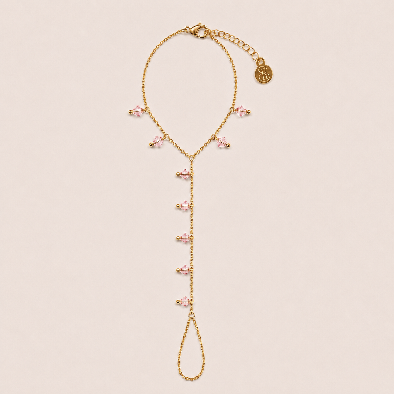 Côte hand chain roze - gold plated