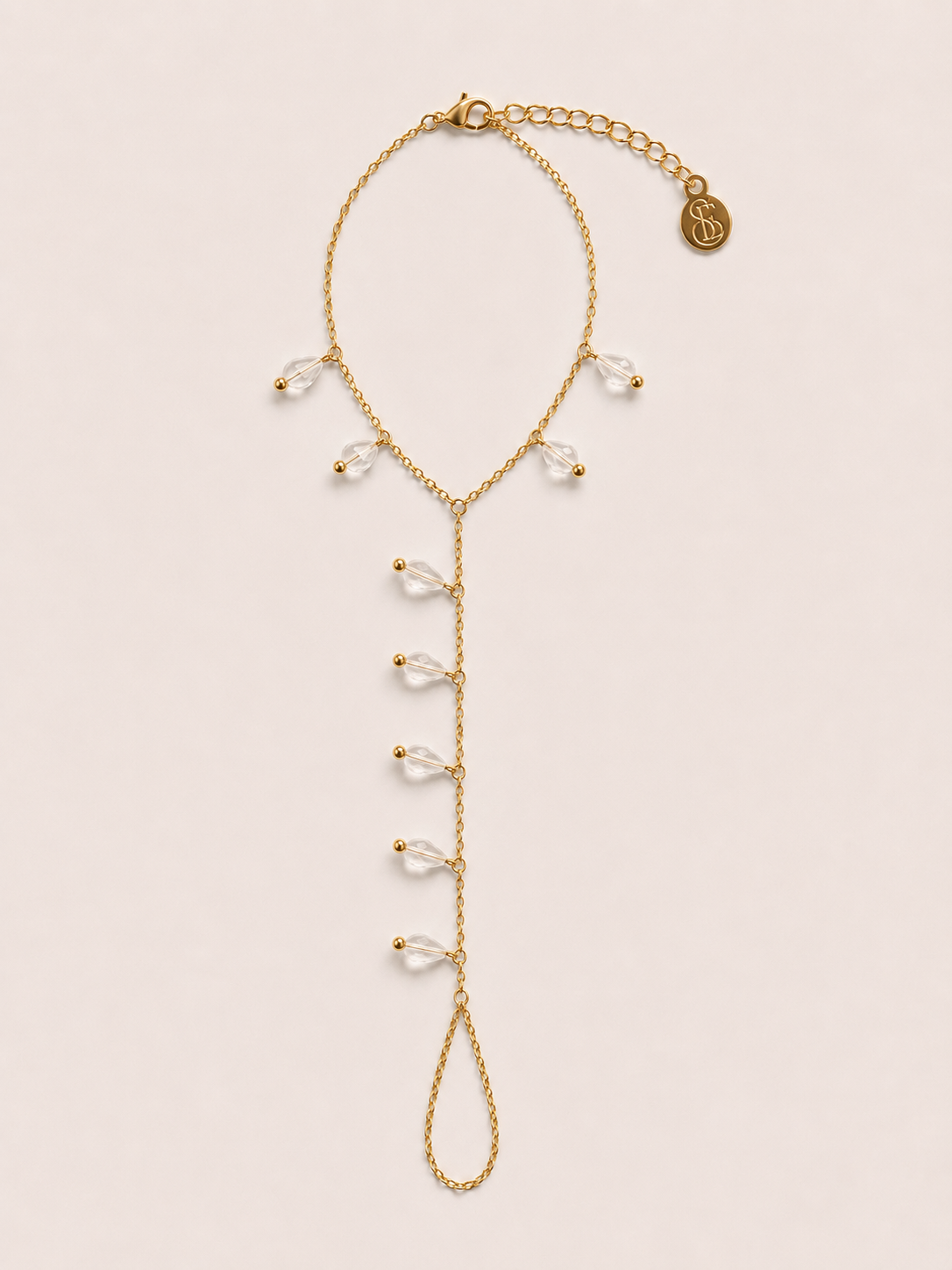 Côte hand chain helder - gold plated