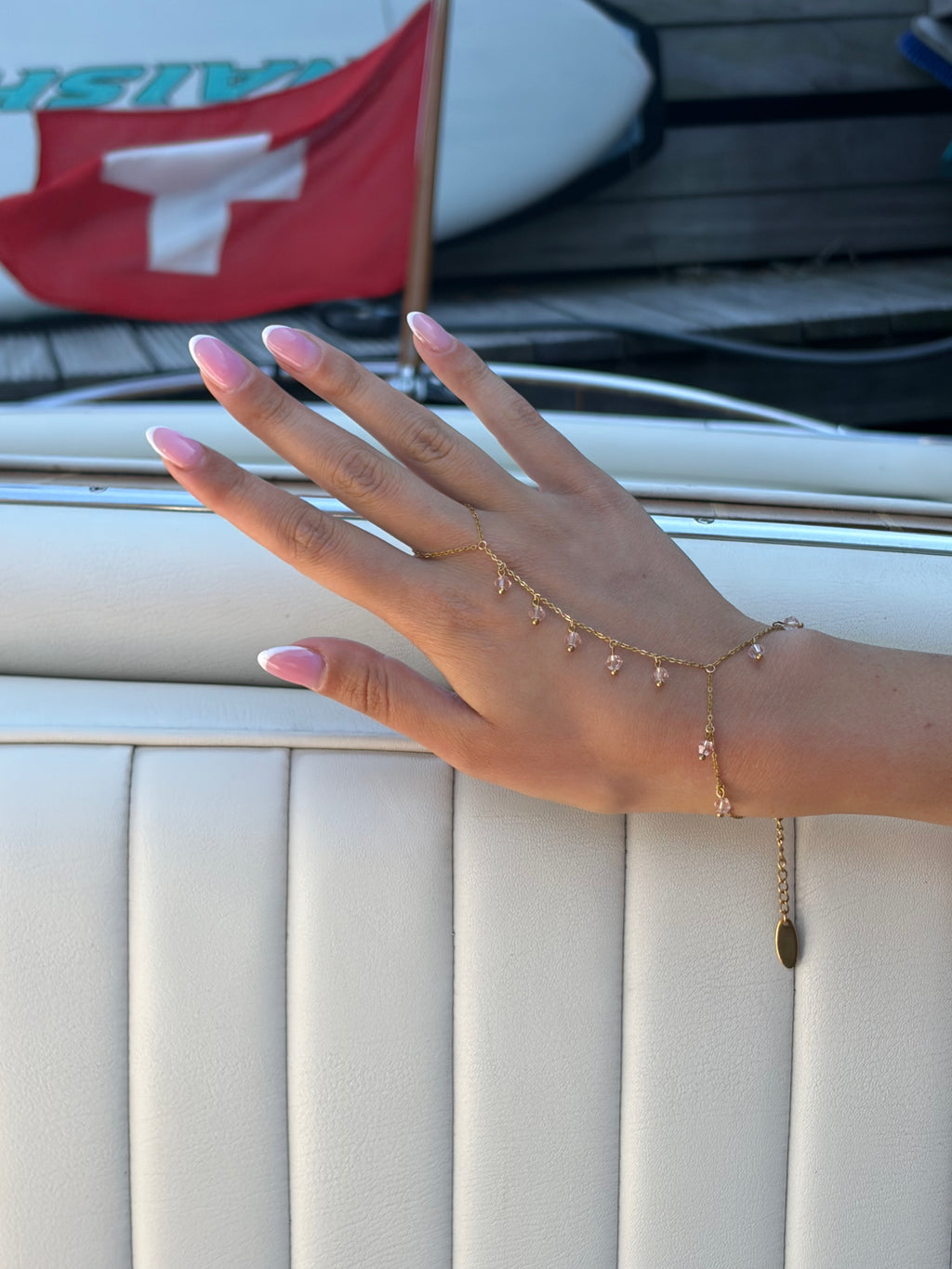 Côte hand chain roze - gold plated